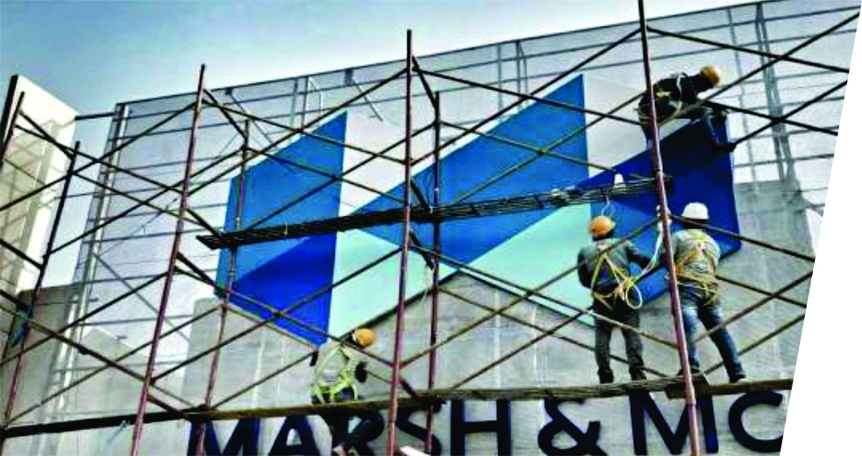 Marsh & McLennan Powai — illuminated LED façade at dusk