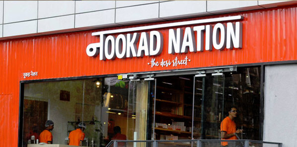 Framed graphic system across the Nookad Nation beverage wall.